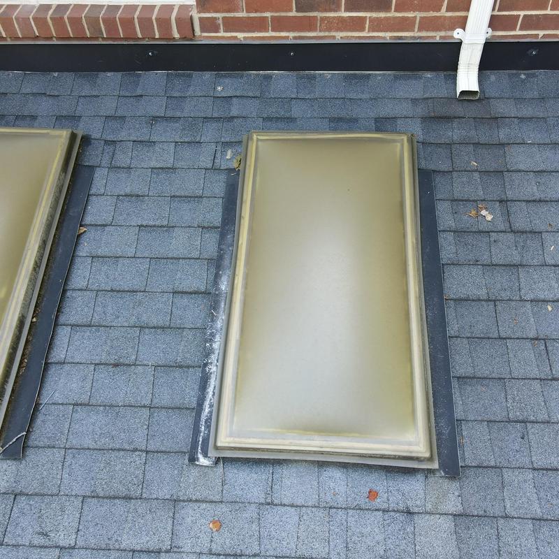 Skylight and roof shingle inspection with flashing