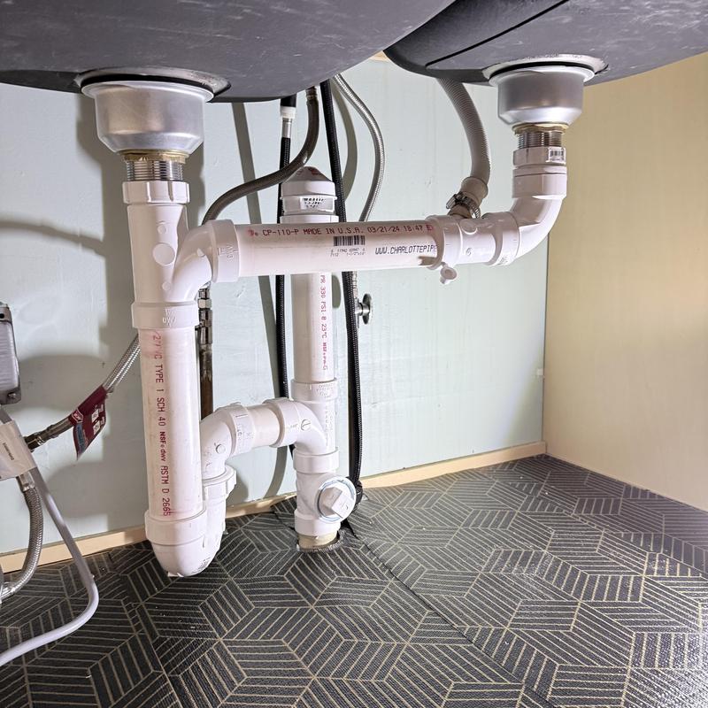 Kitchen sink PVC drain pipes and dishwasher drain line Kitchen sink PVC drain pipes and dishwasher drain line
