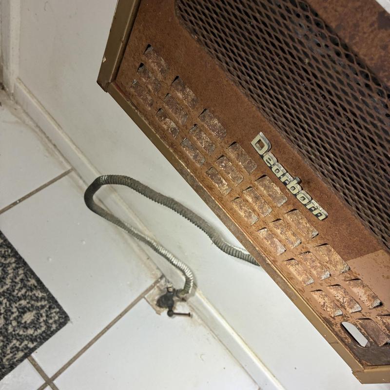 Gas heater with corroded supply line and valve Gas heater with corroded supply line and valve