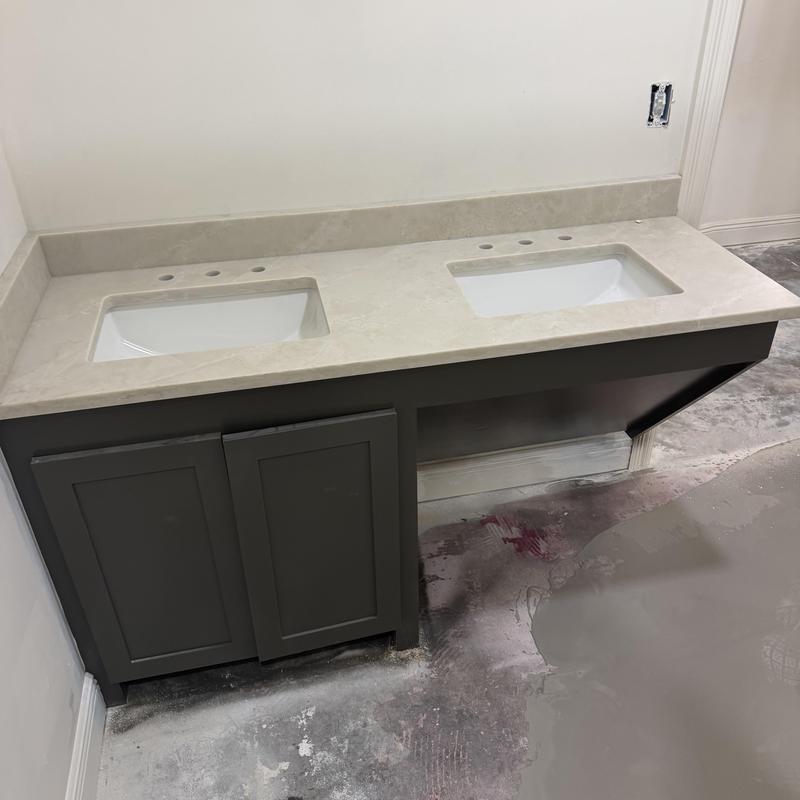 Double undermount sinks with granite vanity countertop