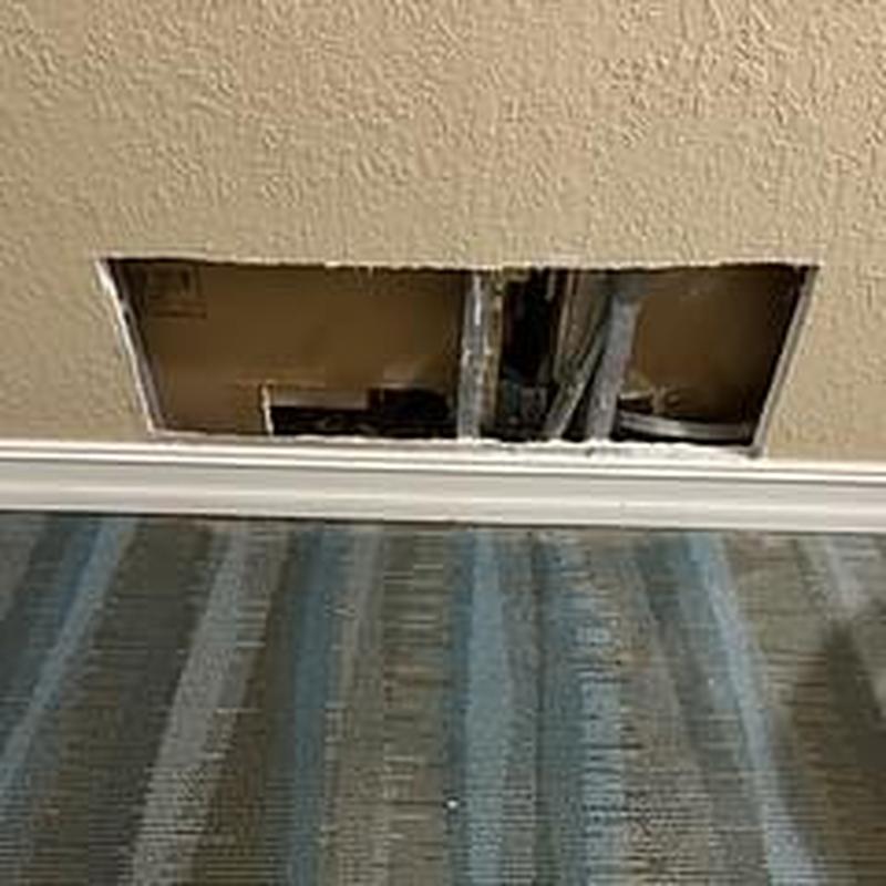 Copper cold water line in opened drywall wall panel