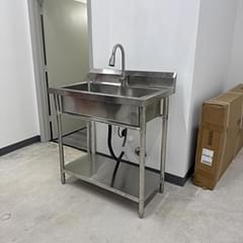 Commercial utility sink with plumbing connections Commercial utility sink with plumbing connections