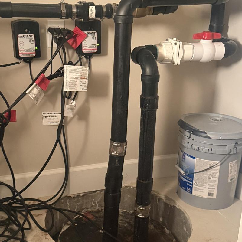 Sump pump PVC pipe and valve assembly with wiring