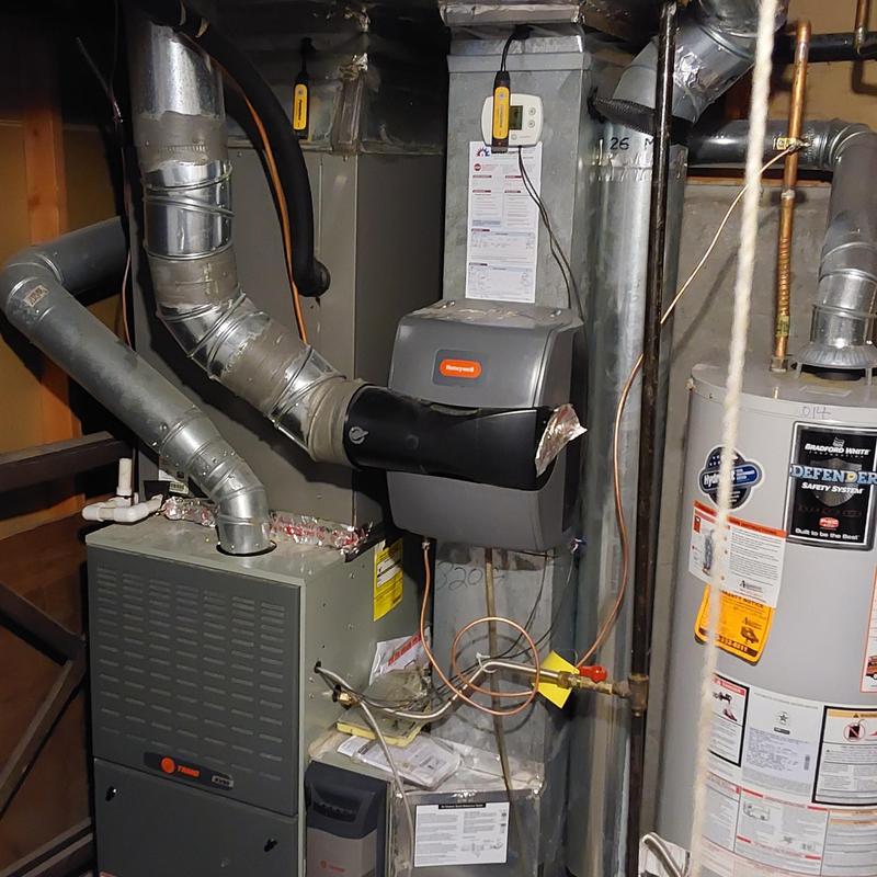 Trane furnace and ductwork in basement utility room