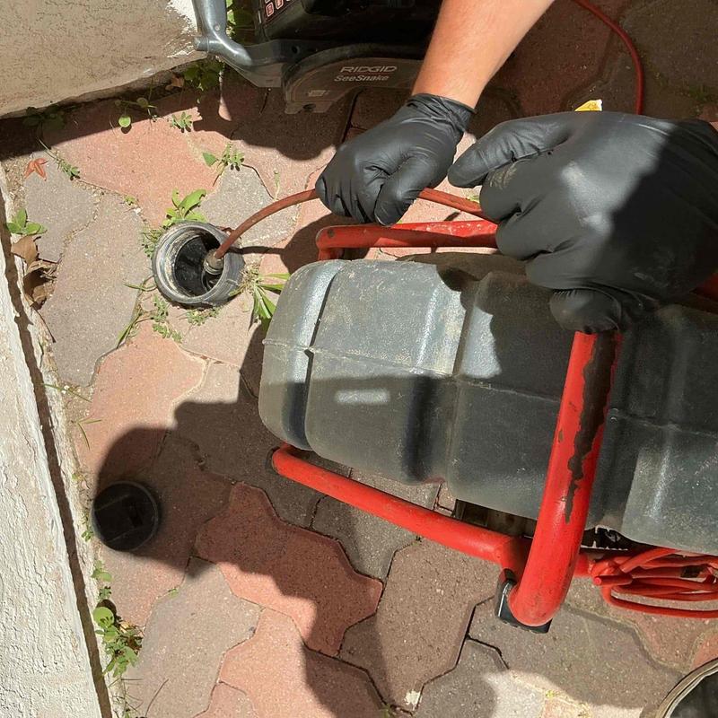 Main sewer line camera inspection with drain snake tool