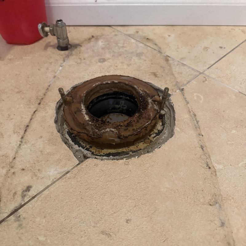 Toilet twist lock flange with broken seal and bolts Toilet twist lock flange with broken seal and bolts