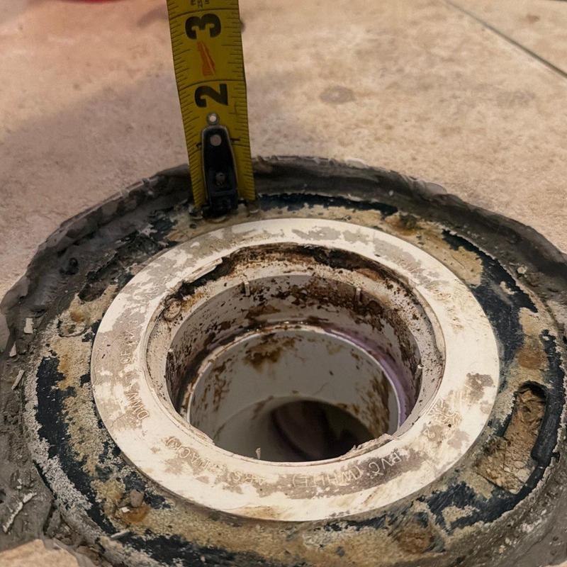 Toilet flange with measuring tape for flange height Toilet flange with measuring tape for flange height