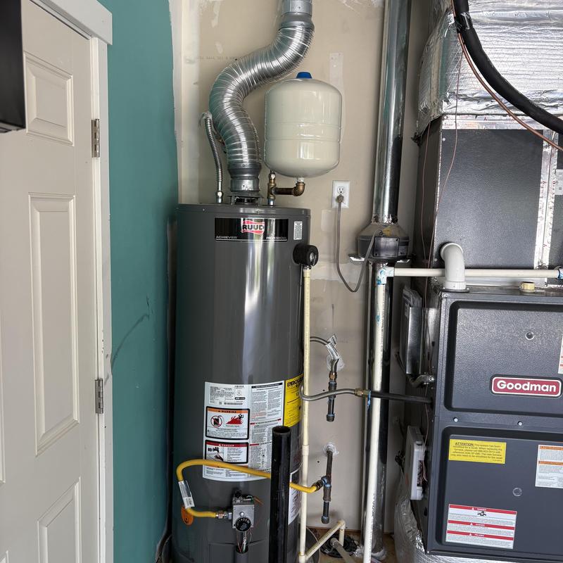 Gas water heater with expansion tank and venting