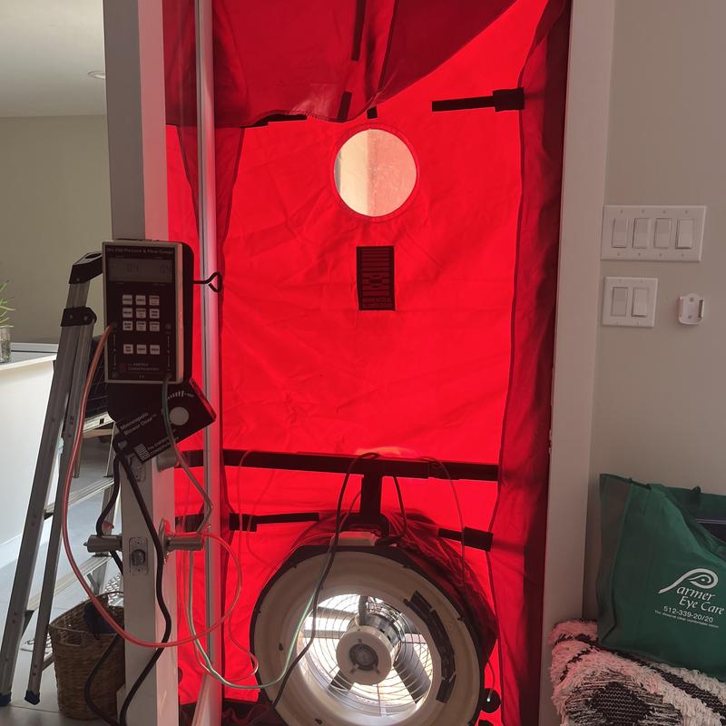 Door blower fan with red fabric sealing for energy audit