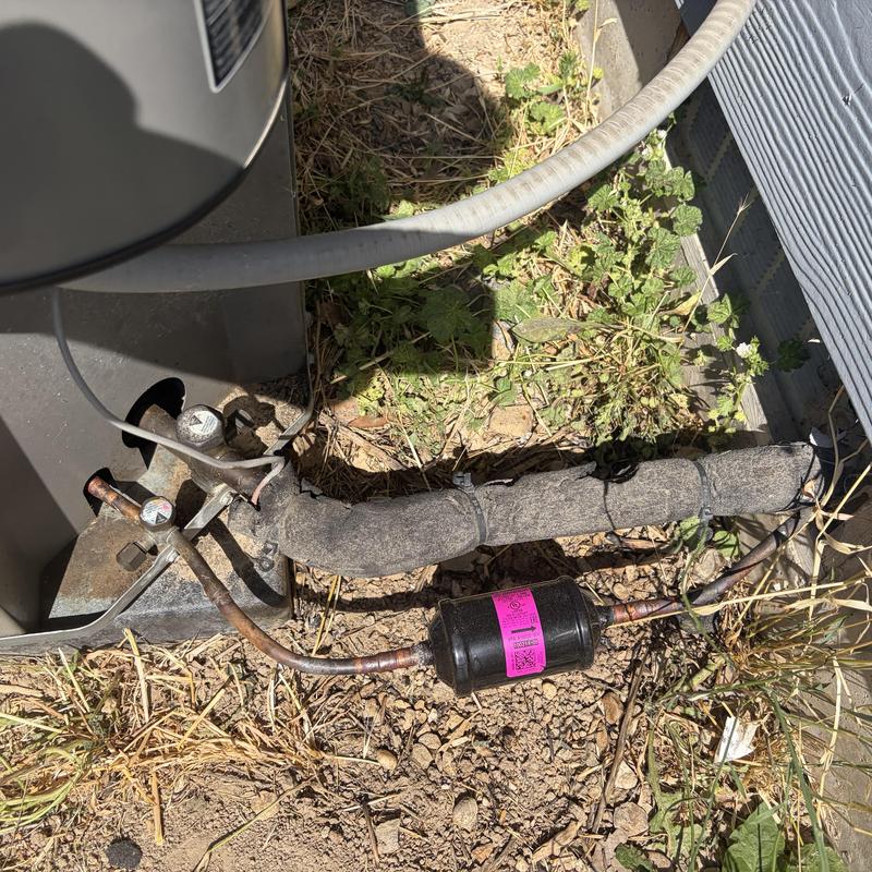 AC outdoor coil refrigerant lines with filter drier replacement