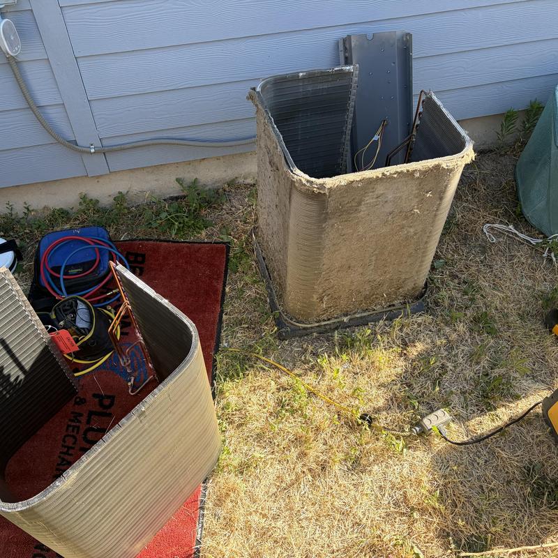AC outdoor coil units removed for replacement