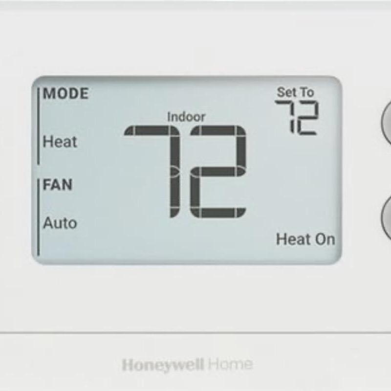 Thermostat display showing heat mode at 72 degrees