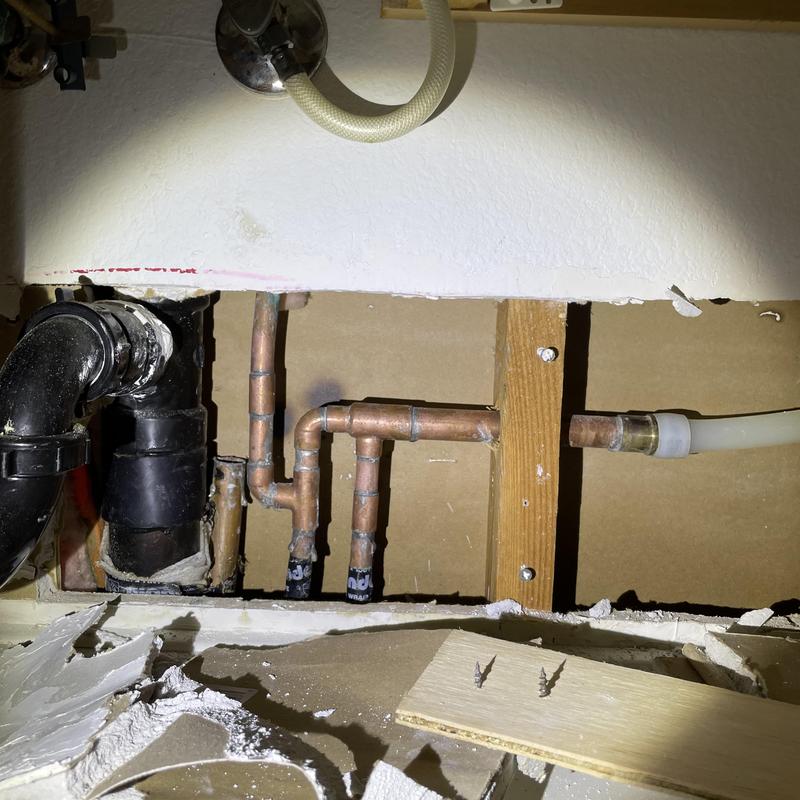 PEX water line reroute and copper plumbing inside wall cavity