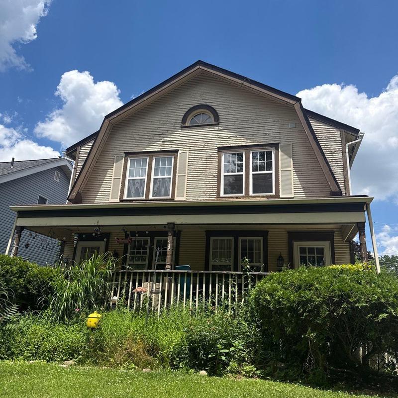 Vinyl siding and soffit exterior inspection on house