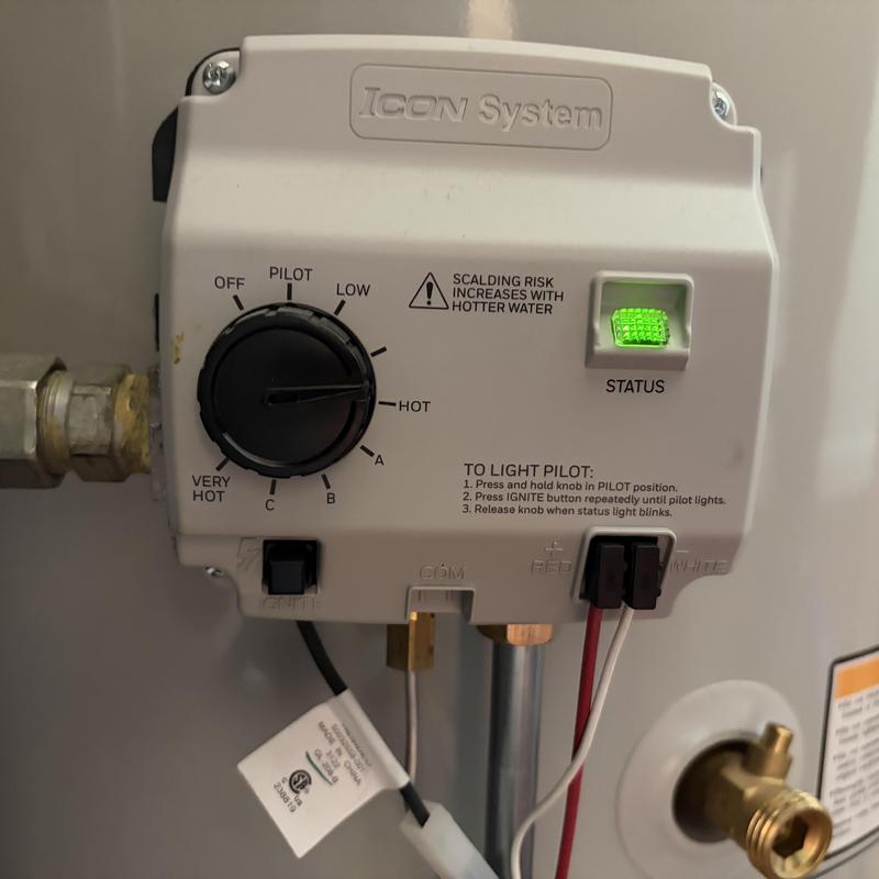 Gas water heater control panel with temperature dial