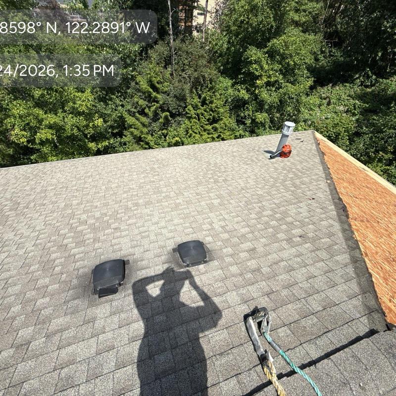 Shingle roof replacement with vents and chimney pipe