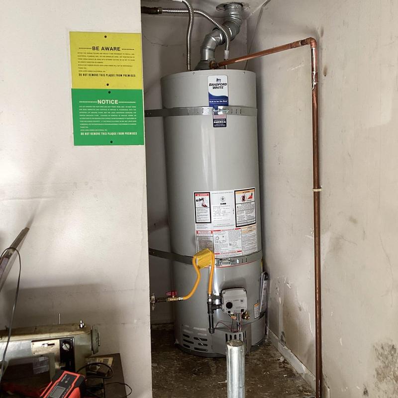 Water heater with new gas line and flex lines
