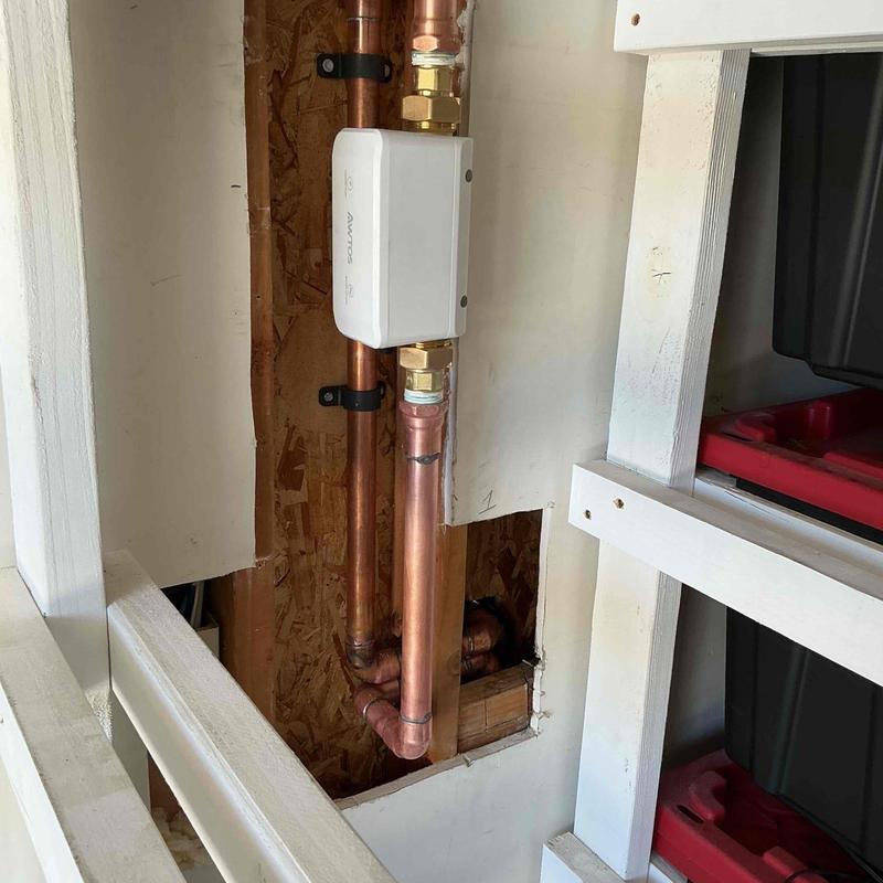 Water main riser with auto shut-off device installed