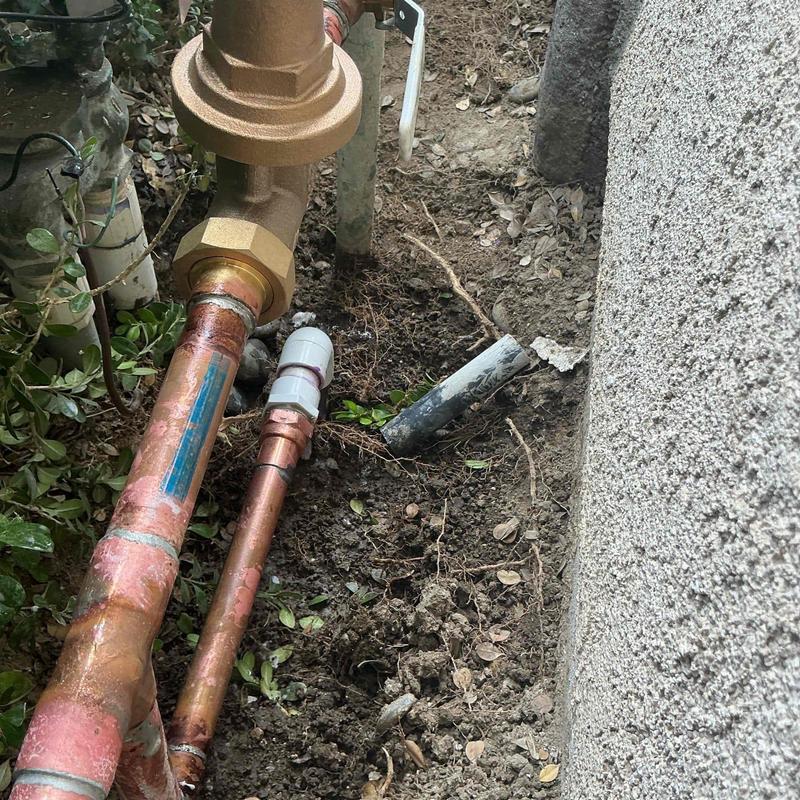 Main water service line ball valve and regulator installation