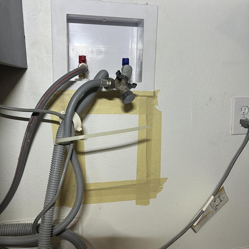 Recessed washer outlet box with valves and hoses