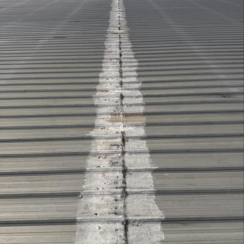 Silicone roof coating repair on metal seam Silicone roof coating repair on metal seam