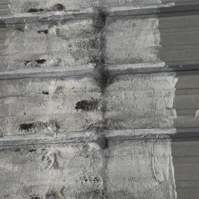 Silicone roof membrane with new coating layer applied Silicone roof membrane with new coating layer applied