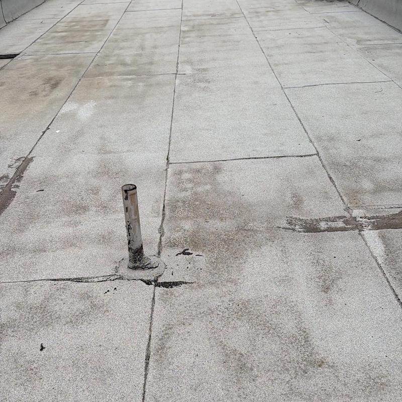 Torch down flat roofing with pipe flashing and seams Torch down flat roofing with pipe flashing and seams