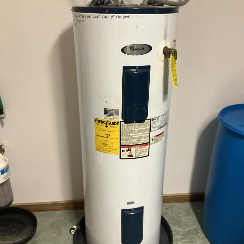 Water heater with energy guide label and pressure valve