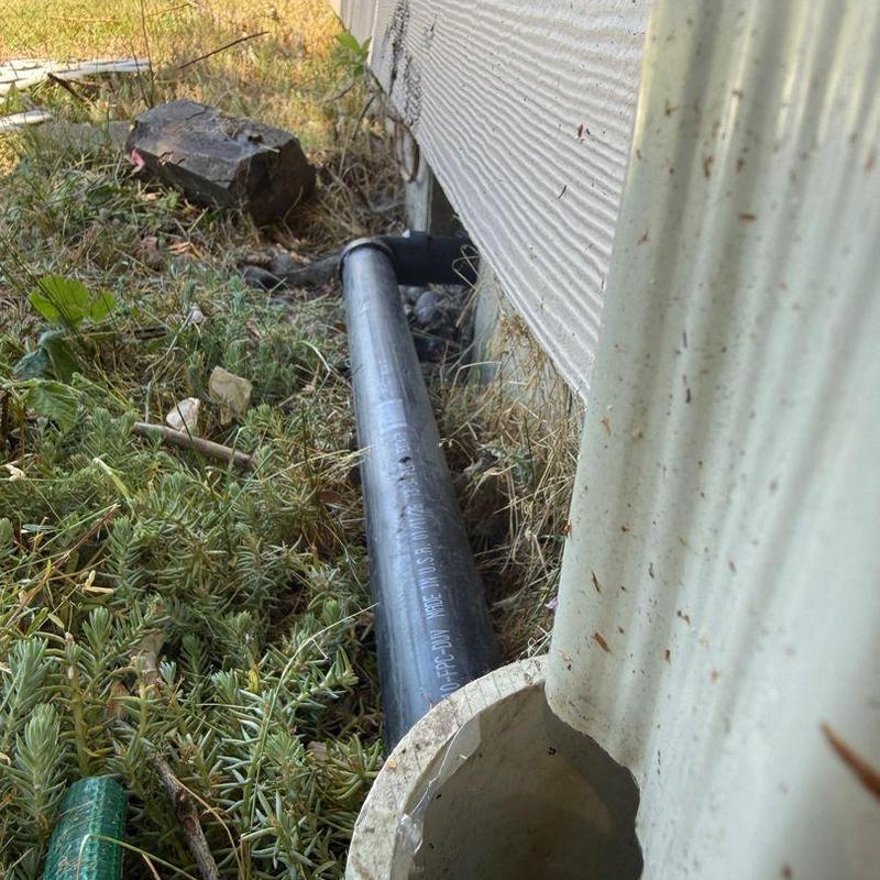 Submersible sump pump discharge line with check valve Submersible sump pump discharge line with check valve