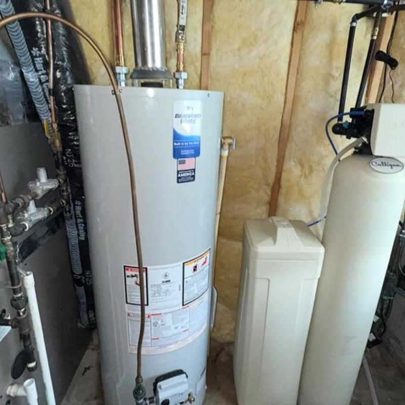 Water heater and water softener system in basement