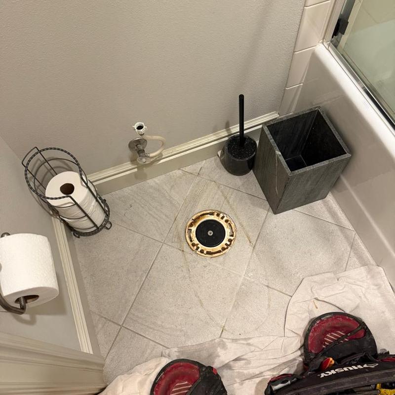 Toilet flange and plumbing in bathroom remodel