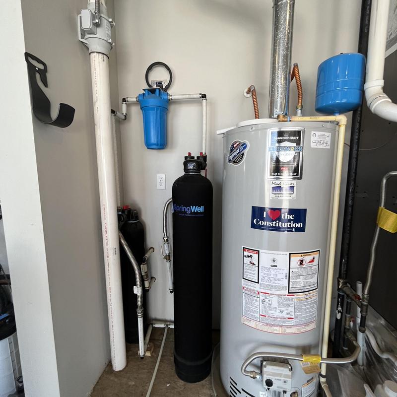 Water softener system with filter and water heater