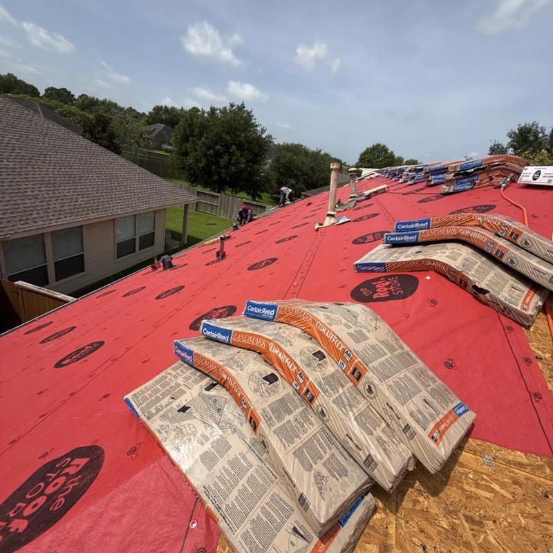 CertainTeed ClimateFlex shingles stacked on roof deck