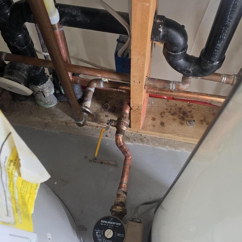Copper water piping with shutoff valve and pump