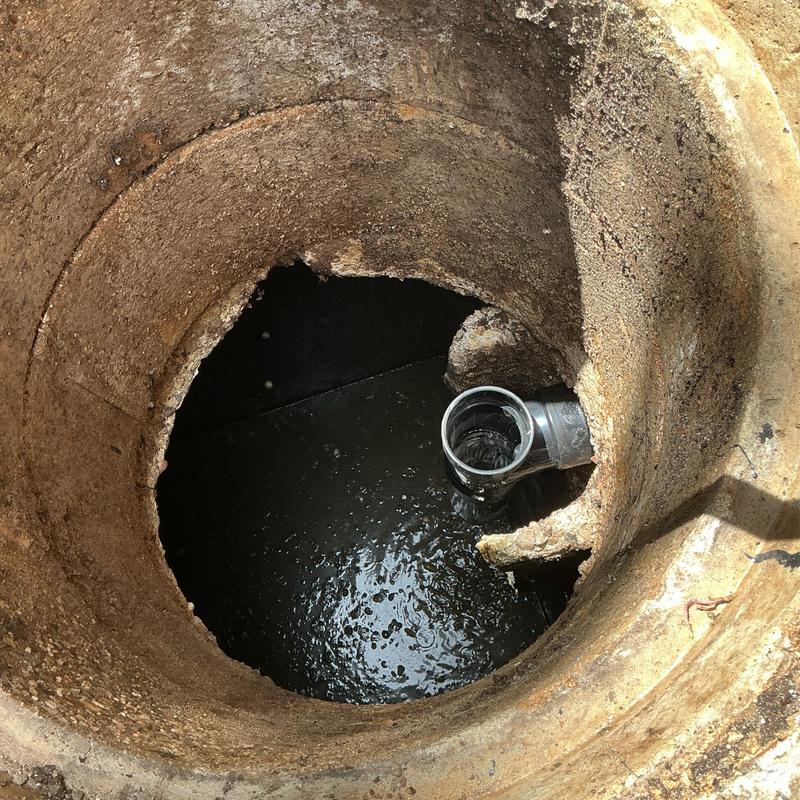 Septic tank inlet pipe with fluid inside