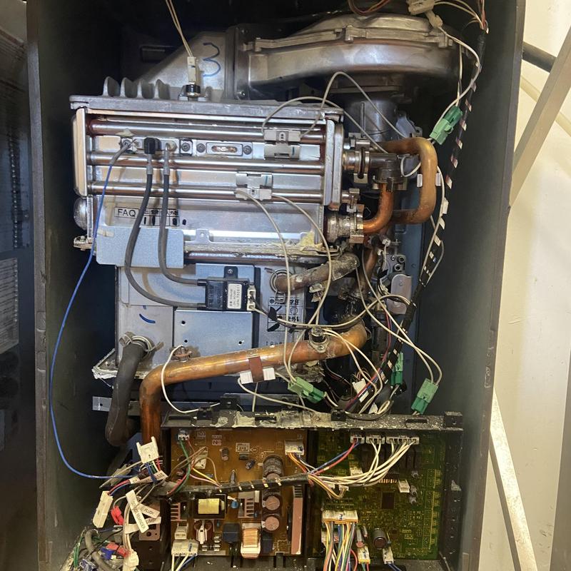 Tankless water heater heat exchanger with wiring