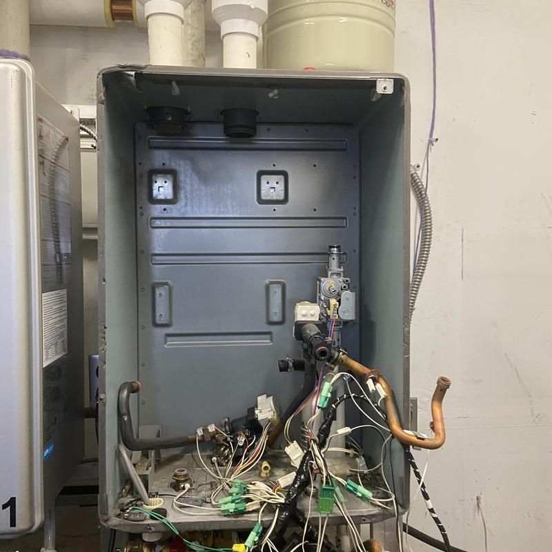 Tankless water heater heat exchanger replacement setup