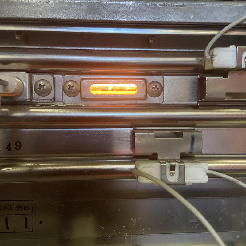 Tankless water heater heat exchanger glowing red-hot