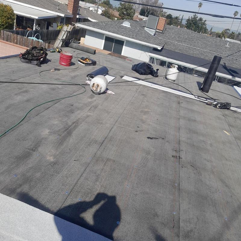 Flat roofing membrane installation with tools and materials Flat roofing membrane installation with tools and materials