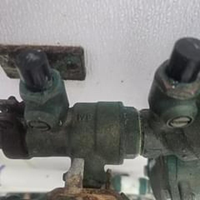 Backflow prevention valve with test cocks on wall Backflow prevention valve with test cocks on wall