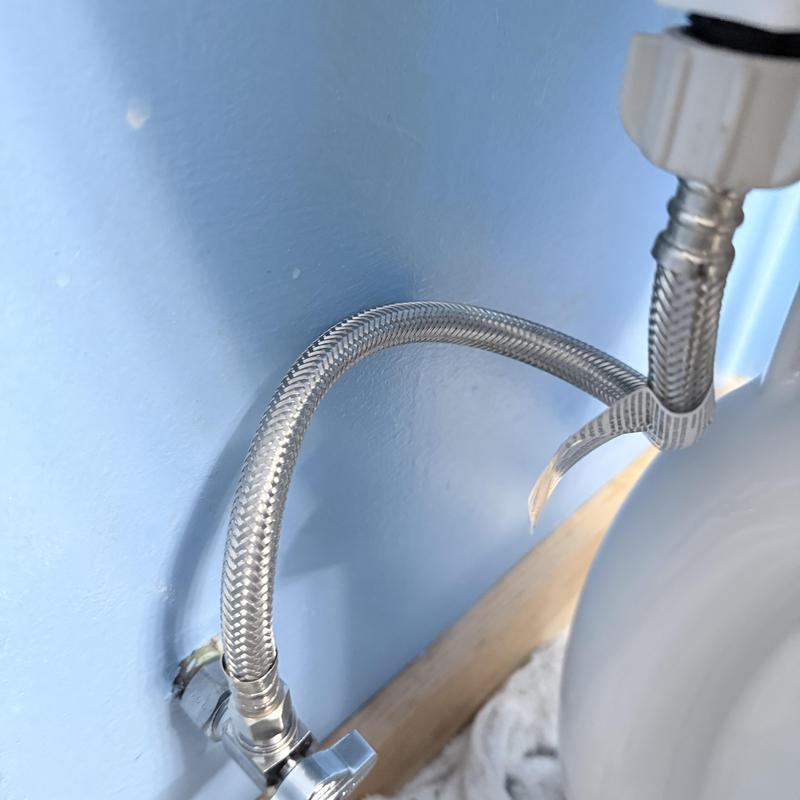 Flexible toilet water supply line with shutoff valve Flexible toilet water supply line with shutoff valve