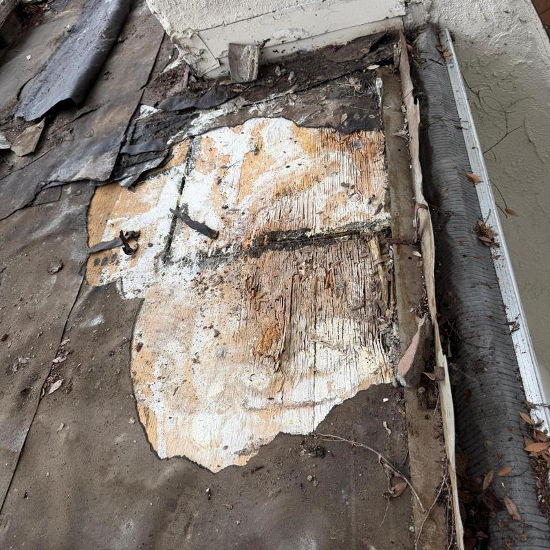 Roof decking with water damage and debris removal Roof decking with water damage and debris removal