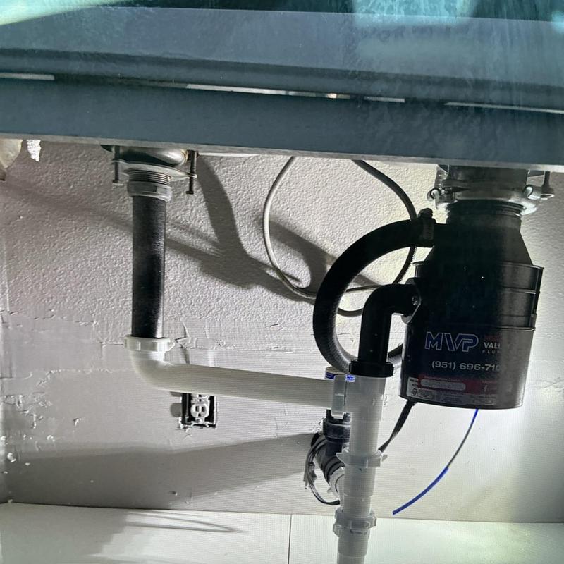 Garbage disposal and double basin sink drain piping