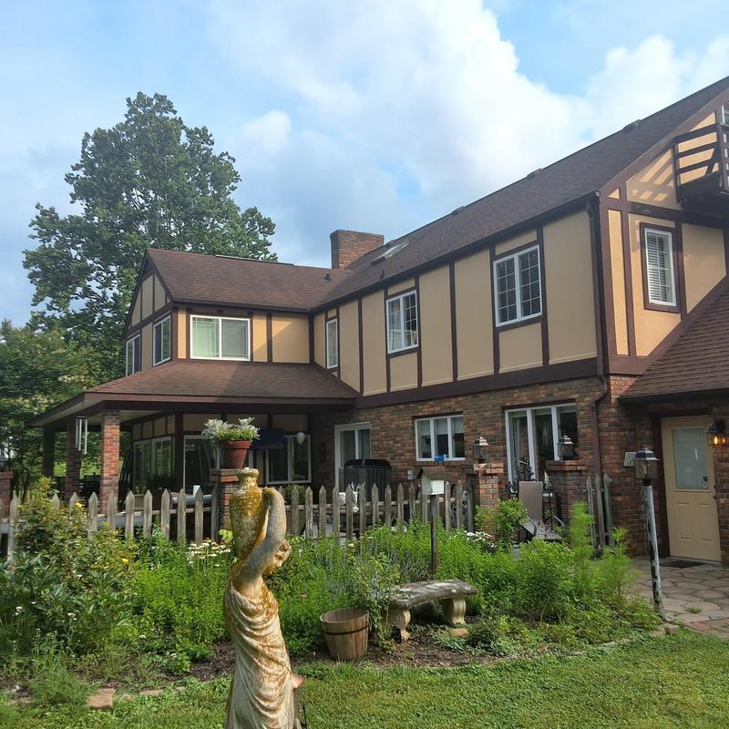 Asphalt shingle roof inspection on two-story home Asphalt shingle roof inspection on two-story home