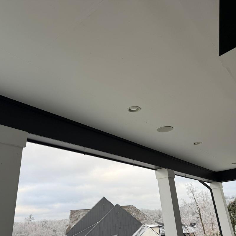Porch ceiling with recessed lighting and speakers
