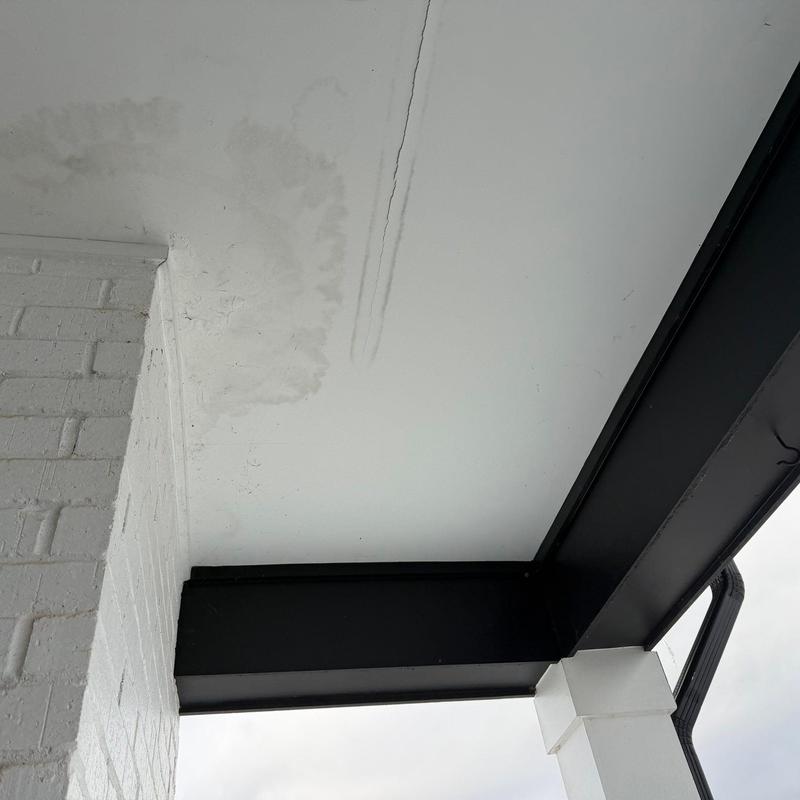 Ceiling water stains and cracking near beam support