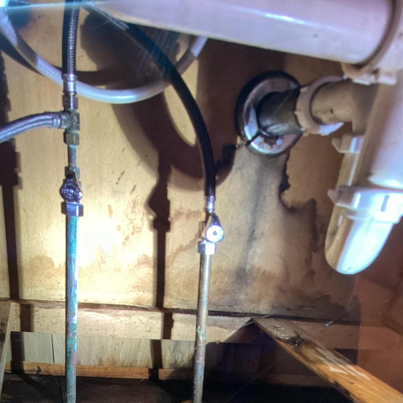 Kitchen sink gate valves and supply lines under sink Kitchen sink gate valves and supply lines under sink