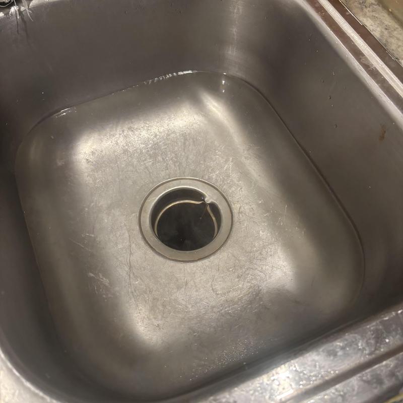 Kitchen sink drain after clog removal, no water buildup