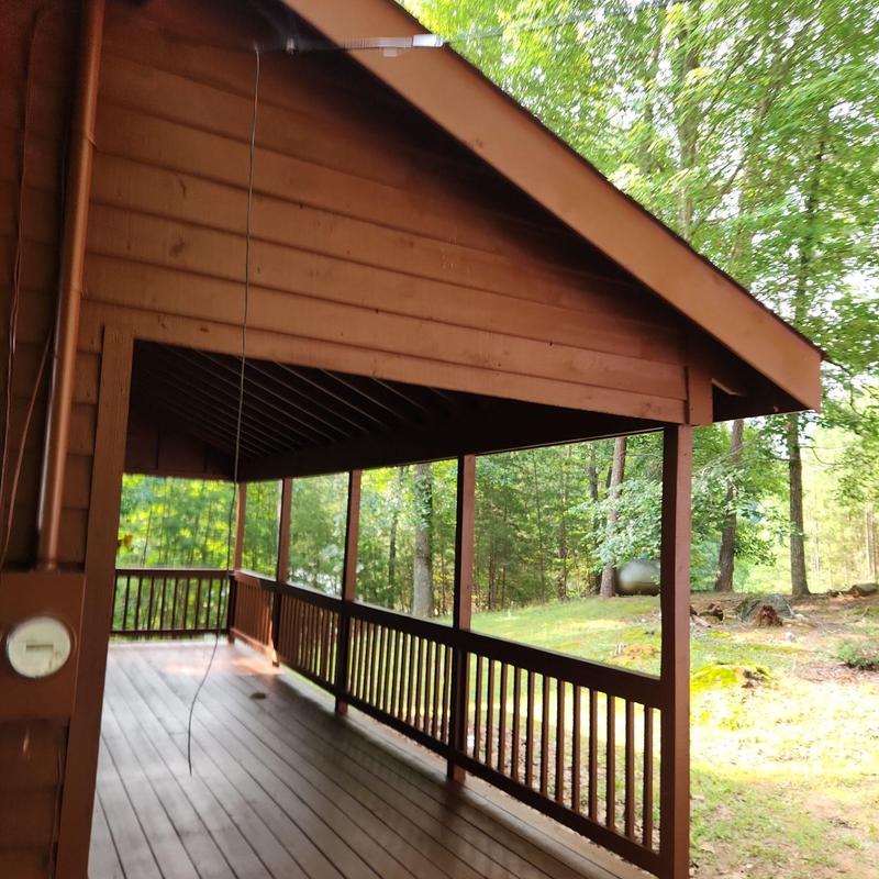 Wood deck and railing stained and restored