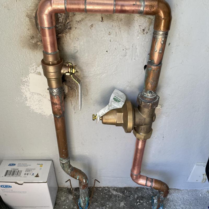 Copper plumbing ball valve and pressure regulator installation